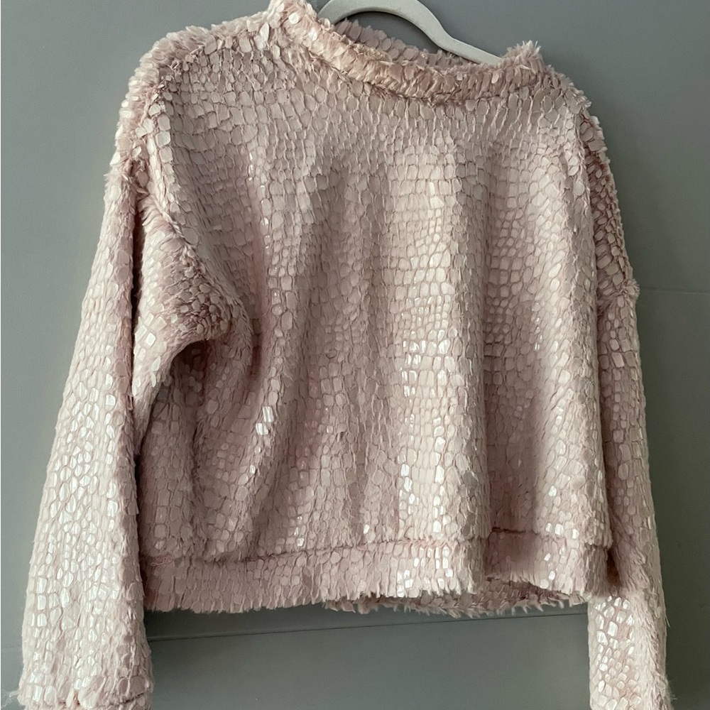 Beautiful women’s palette, pale pink sweater, perfect for nighttime or daytime